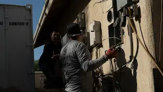 Old electrical panel before replacement