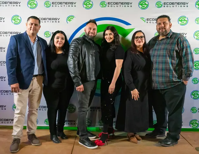 A group of EcoEnergy Solutions staff at a promotional event
