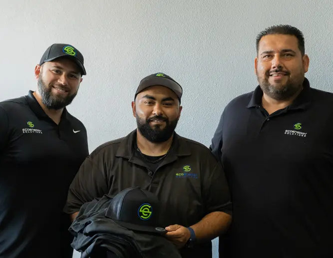 Three smiling members of the EcoEnergy Solutions team