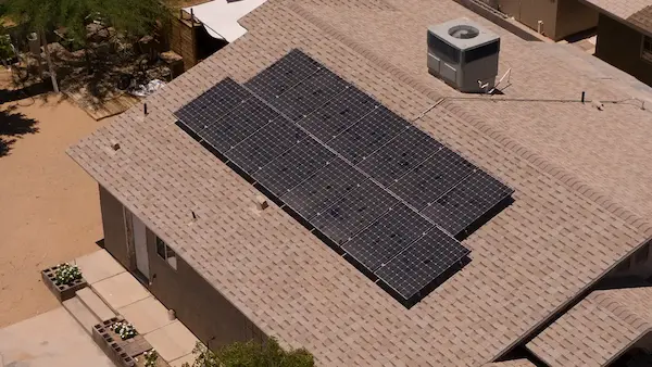 Solar panels on a red tile roof