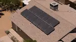 Icon of solar panels on a red tile roof