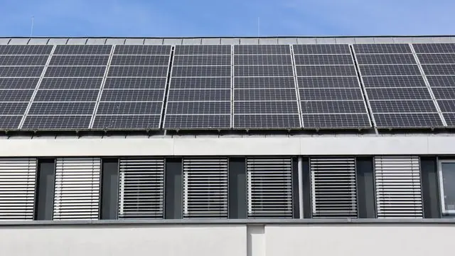 Commercial Rooftop Solar Panel Array on a Business Building