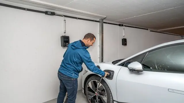 Tesla Wall Connector EV Charging Station Installed in a Home Garage