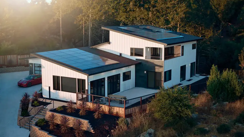 Aerial View of a Home With Rooftop Solar and Tesla Powerwall
