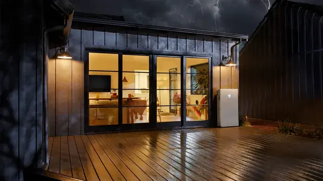 Home Kept Lit by a Tesla Powerwall During a Night Storm Outage