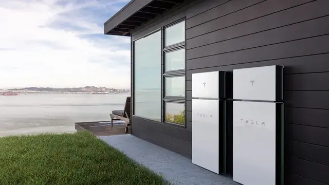 Two Tesla Powerwall Units Installed Side by Side on a Home Exterior